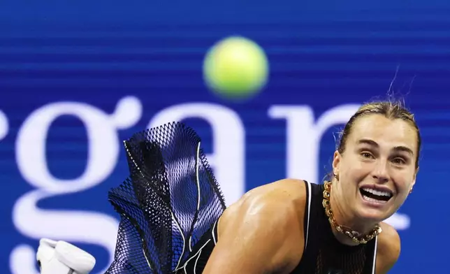 Aryna Sabalenka, of Belarus, serves to Polina Iatcenko, of Russia, during the second round of the U.S. Open tennis championships, Wednesday, Sept. 2, 2026, in New York. (AP Photo/Adam Hunger)