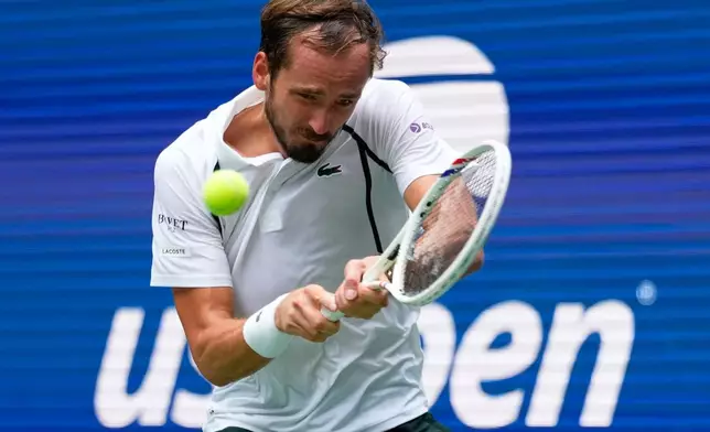 Daniil Medvedev, of Russia, returns the ball to Sebastian Gorzny, of the United States, during the second round of the U.S. Open tennis championships Wednesday, Sept. 2, 2026, in New York. (AP Photo/Yuki Iwamura)