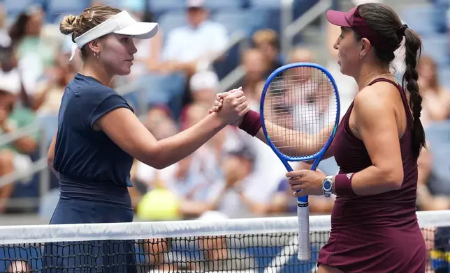 Jessica Pegula, of the United States, greets Sofia Kenin, of the United States, left, after Pegula won their match during the second round of the U.S. Open tennis championships Wednesday, Sept. 2, 2026, in New York. (AP Photo/Kirsty Wigglesworth)