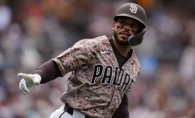 San Diego Padres' Luis Campusano celebrates after hitting a home run during the seventh inning of a baseball game against the New York Yankees Sunday, Sept. 6, 2026, in San Diego. (AP Photo/Gregory Bull)