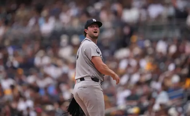 New York Yankees starting pitcher Gerrit Cole watches a home run hit by San Diego Padres' Jake Cronenworth during the first inning of a baseball game Sunday, Sept. 6, 2026, in San Diego. (AP Photo/Gregory Bull)