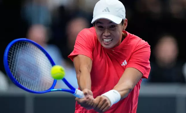 United States' Learner Tien returns the ball Czechia's Jakub Mensik during the Davis Cup second round qualifier match between the Czech Republic and the United States, in Prague, Friday, Sept. 18, 2026. (AP Photo/Petr David Josek)