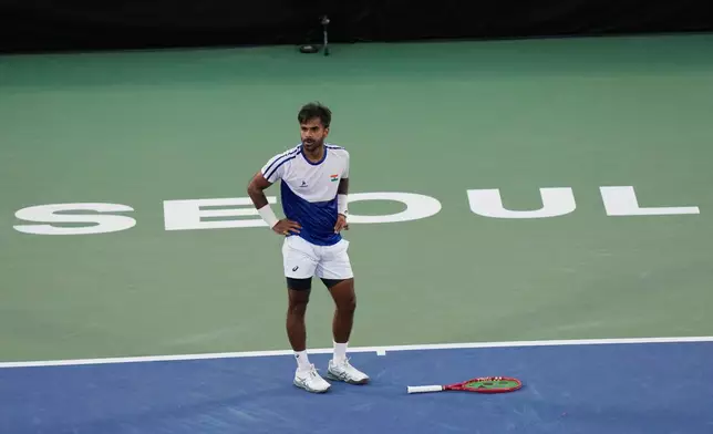 India's Sumit Nagal stands after missing a point against South Korea's Hyeon Chung during a Davis Cup second round qualifier tennis match between South Korea and India, in Seoul, South Korea, Friday, Sept. 18, 2026. (AP Photo/Ahn Young-joon)