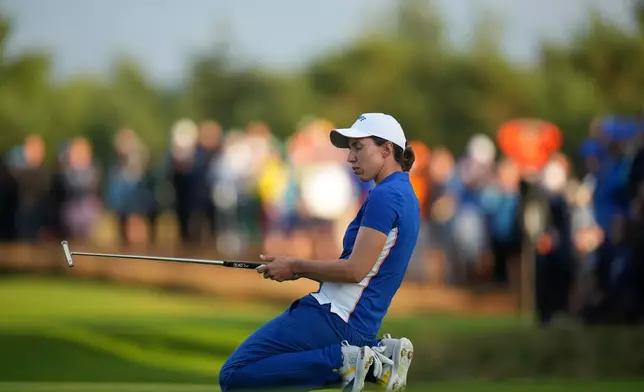 Carlota Ciganda of Europe reacts after missing a putt on the 17th green during the Solheim Cup in Den Bosch, Netherlands, Friday, Sept. 11, 2026. (AP Photo/Alastair Grant)