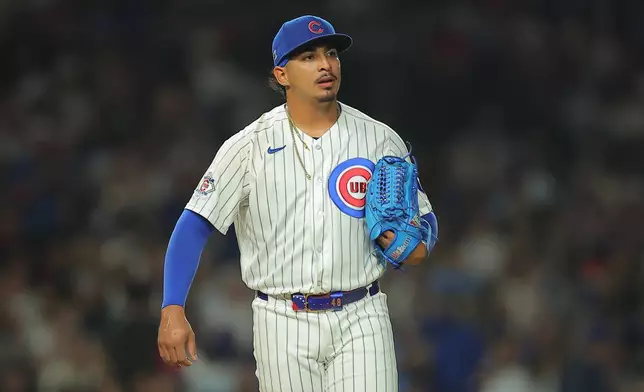 Chicago Cubs' Daniel Palencia looks on after allowing a run on a balk during the sixth inning of a baseball game against the Milwaukee Brewers, Tuesday, Sept. 1, 2026, in Chicago. (AP Photo/Melissa Tamez)