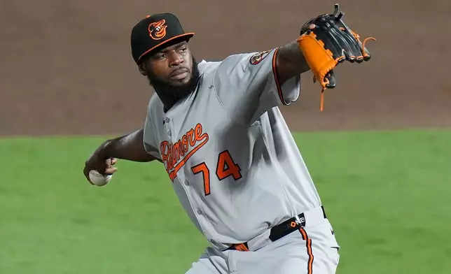 FILE - Baltimore Orioles pitcher Félix Bautista delivers to the Tampa Bay Rays during the ninth inning of a baseball game Tuesday, June 17, 2025, in Tampa, Fla. (AP Photo/Chris O'Meara,File)