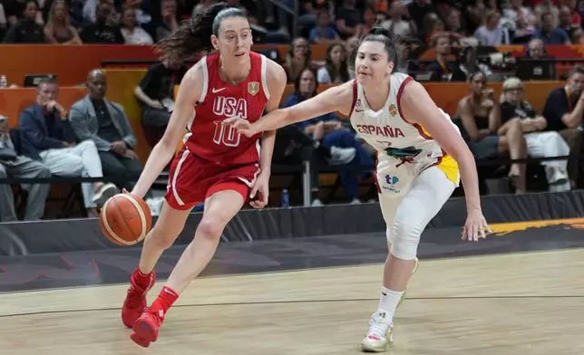 during the Women's Basketball World Cup semifinal match between the United States and Spain in Berlin, Saturday, Sept. 12, 2026. (AP Photo/Ebrahim Noroozi)