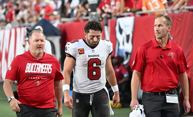 Tampa Bay Buccaneers quarterback Baker Mayfield (6) leaves the field during the second half of an NFL football game against the Minnesota Vikings in Tampa, Fla., Sunday, Sept. 27, 2026. (AP Photo/Jason Behnken)