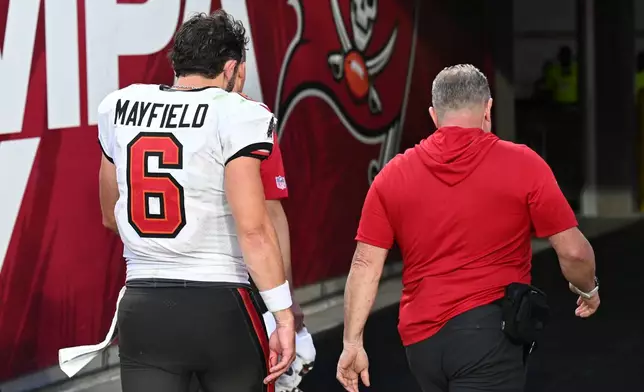 Tampa Bay Buccaneers quarterback Baker Mayfield (6) leaves the field during the second half of an NFL football game against the Minnesota Vikings in Tampa, Fla., Sunday, Sept. 27, 2026. (AP Photo/Jason Behnken)