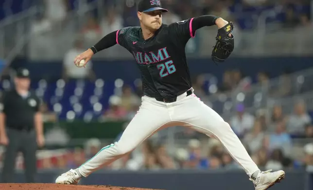Miami Marlins starting pitcher Janson Junk (26) aims a pitch during the first inning of a baseball game against the Chicago Cubs Friday, Sept. 4, 2026, in Miami. (AP Photo/Marta Lavandier)