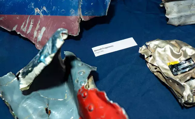 Pieces of the metal fuselage recovered from the wreckage of United Airlines Flight 93 in Shanksville, Pa., are displayed at the Smithsonian's National Museum of American History in Washington, Thursday, Sept. 10, 2026. (AP Photo/J. Scott Applewhite)