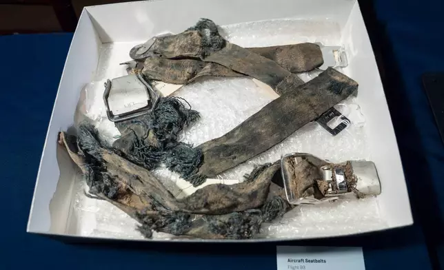 Seatbelts recovered from the wreckage of United Airlines Flight 93 in Shanksville, Pa., are displayed at the Smithsonian's National Museum of American History in Washington, Thursday, Sept. 10, 2026. (AP Photo/J. Scott Applewhite)