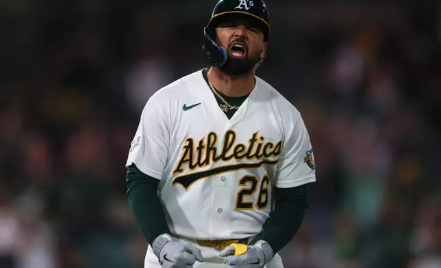 Athletics' Carlos Cortes reacts after hitting a go ahead two-run home run during the eighth inning of a baseball game against the Los Angeles Angels Tuesday, Sept. 22, 2026, in West Sacramento, Calif. (AP Photo/Scott Marshall)