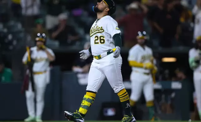 Athletics' Carlos Cortes celebrates after hitting a go ahead two-run home run during the eighth inning of a baseball game against the Los Angeles Angels Tuesday, Sept. 22, 2026, in West Sacramento, Calif. (AP Photo/Scott Marshall)