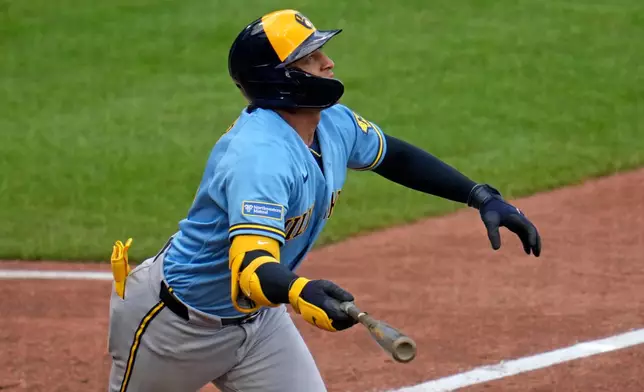 Milwaukee Brewers' Bo Naylor (14) watches his solo home run off Pittsburgh Pirates pitcher Luke Weaver during the eighth inning of a baseball game in Pittsburgh, Thursday, Sept. 17, 2026. (AP Photo/Gene J. Puskar)