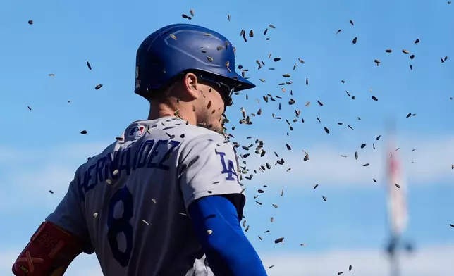 Los Angeles Dodgers' Enrique Hernández celebrates after hitting a home run during the ninth inning of a baseball game against the San Francisco Giants, Saturday, Sept. 26, 2026, in San Francisco. (AP Photo/Jeff Chiu)