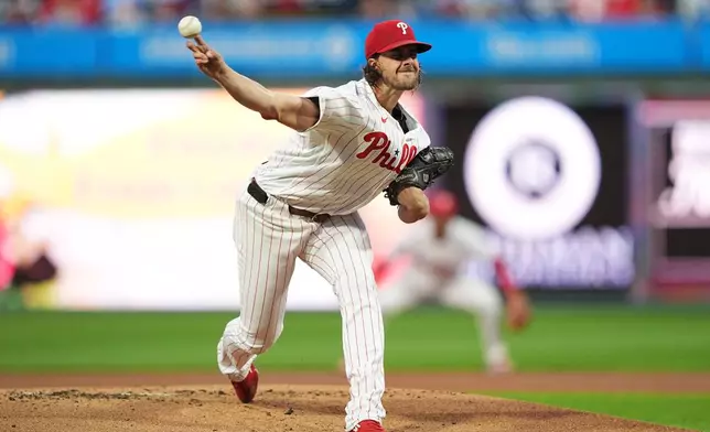 Philadelphia Phillies' Aaron Nola pitches during the first inning of a baseball game against the Milwaukee Brewers, Wednesday, Sept. 23, 2026, in Philadelphia. (AP Photo/Matt Rourke)