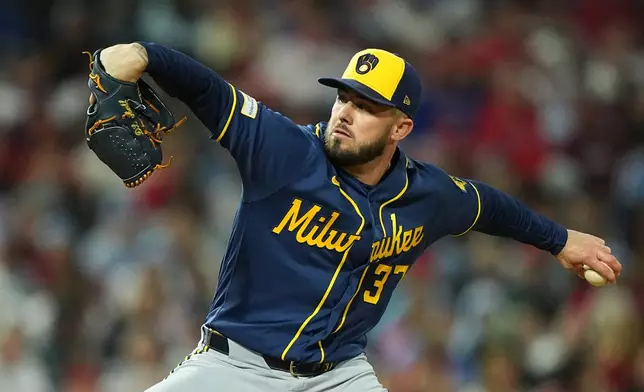 Milwaukee Brewers' Dl Hall pitches during the sixth inning of a baseball game against the Philadelphia Phillies, Wednesday, Sept. 23, 2026, in Philadelphia. (AP Photo/Matt Rourke)