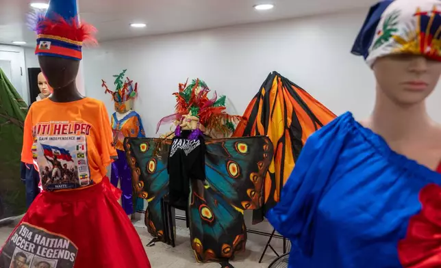 Haitian costumes for Lespri Ayiti Mas Camp are displayed ahead of the West Indian Day Parade, Thursday, Sept. 3, 2026, in the Brooklyn borough of New York. (AP Photo/Adam Gray)