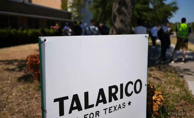 People arrive before Democratic U.S. Senate candidate Texas state Rep. James Talarico speaks at a food drive at the Frederick Douglass Human Services and Justice Center, Wednesday, Sept. 9, 2026, in Dallas. (AP Photo/Julia Demaree Nikhinson)