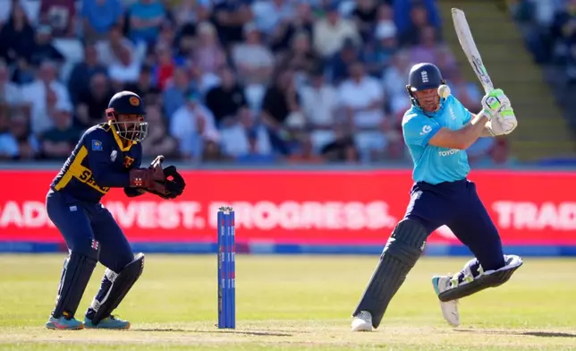 England's Jos Buttler bats during the 1st one day international cricket match between England and Sri Lanka in Chester-le-Street, England, Tuesday Sept. 22, 2026. (Owen Humphreys/PA via AP)