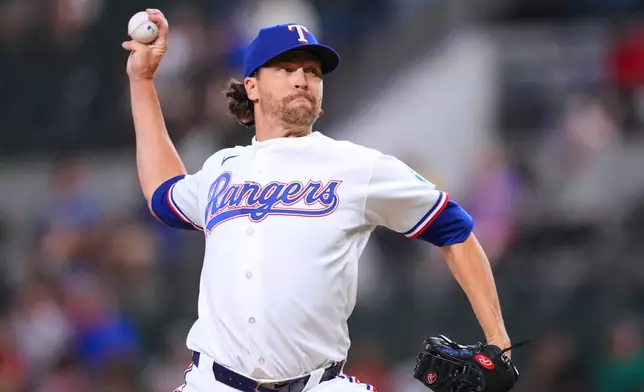 Texas Rangers pitcher Jacob deGrom throws to the Athletics during the first inning of a baseball game Monday, Aug. 31, 2026, in Arlington, Texas. (AP Photo/Julio Cortez)
