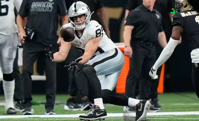 Las Vegas Raiders tight end Brock Bowers catches a pass during the second half of an NFL football game against the New Orleans Saints in New Orleans, Sunday, Sept. 27, 2026. (AP Photo/Gerald Herbert)