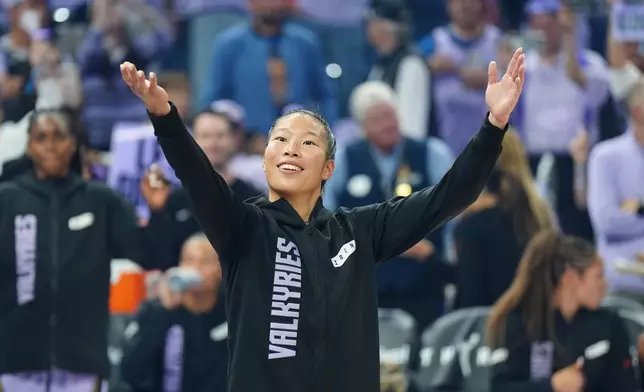 Golden State Valkyries guard Kaitlyn Chen gestures to the crowd before a WNBA basketball first-round playoff game against the Dallas Wings Sunday, Sept. 27, 2026, in San Francisco. (AP Photo/Alan Greth)
