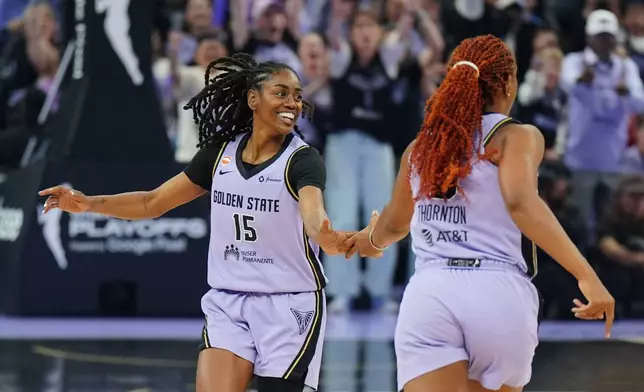 Golden State Valkyries guard Tiffany Hayes (15) reacts after hitting a 3-point shot during the first half of a WNBA basketball first-round playoff game against the Dallas Wings Sunday, Sept. 27, 2026, in San Francisco. (AP Photo/Alan Greth)