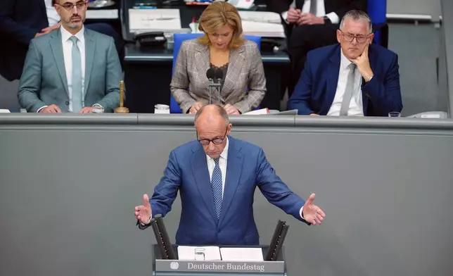 German Chancellor Friedrich Merz participates in the general debate as part of the budget deliberations in the Bundestag, in Berlin, Wednesday Sept. 9, 2026. (Kay Nietfeld/dpa via AP)