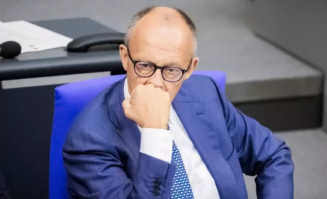 German Chancellor Friedrich Merz looks on during the general debate as part of the budget deliberations in the Bundestag, in Berlin, Wednesday Sept. 9, 2026 (Christoph Soeder/dpa via AP)