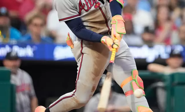 Atlanta Braves' Ronald Acuña Jr. hits a run-scoring single against Philadelphia Phillies pitcher Cristopher Sánchez during the second inning of a baseball game Friday, Sept. 4, 2026, in Philadelphia. (AP Photo/Matt Slocum)