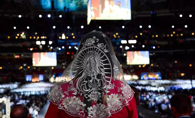 Worshippers gather for the beatification of Archbishop Fulton Sheen held at the Dome at America's Center in St. Louis, on Thursday, Sept. 24, 2026. (AP Photo/Kate Munsch)