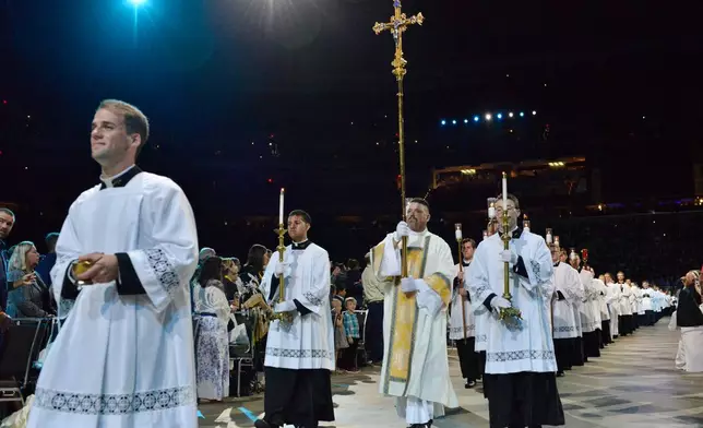 Religious leaders participate in a processional for the beatification of Archbishop Fulton Sheen held at the Dome at America's Center in St. Louis, on Thursday, Sept. 24, 2026. (AP Photo/Kate Munsch)