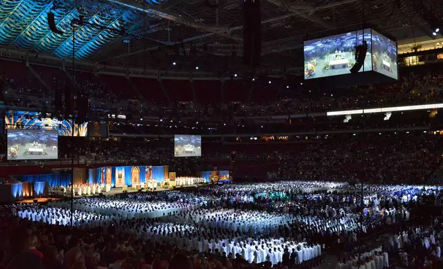 Worshippers gather for the beatification of Archbishop Fulton Sheen held at the Dome at America's Center in St. Louis, on Thursday, Sept. 24, 2026. (AP Photo/Kate Munsch)