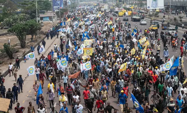 People march during a protest organized by opposition parties against constitutional changes proposed by President Felix Tshisekedi, in Kinshasa, Congo, Tuesday, Sept. 15, 2026. (AP Photo/Samy Ntumba Shambuyi)