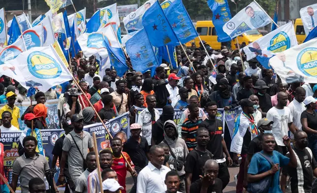 People march during a protest organized by opposition parties against constitutional changes proposed by President Felix Tshisekedi, in Kinshasa, Congo, Tuesday, Sept. 15, 2026. (AP Photo/Samy Ntumba Shambuyi)