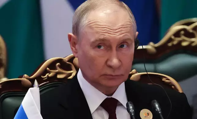 Russian President Vladimir Putin attends a session of the BRICS Plus Outreach format in New Delhi, India, on Sunday, Sept. 13, 2026. (Alexander Kazakov, Sputnik, Kremlin Pool Photo via AP)