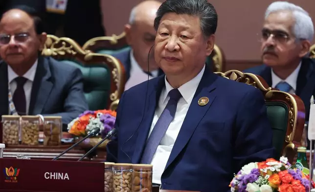 Chinese President Xi Jinping attends a session of the BRICS Plus Outreach format in New Delhi, India, on Sunday, Sept. 13, 2026. (Alexander Kazakov, Sputnik, Kremlin Pool Photo via AP)