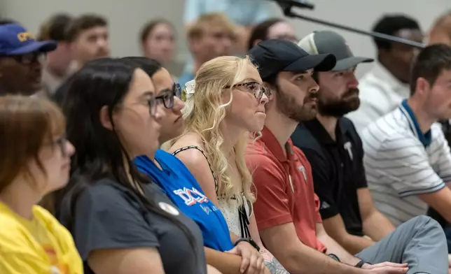 FILE - Attendees listen as Doug Jones, Democratic nominee for Governor of Alabama, speaks at a town hall hosted by Troy University College Democrats and the Pike County Democrats, Aug. 18, 2026, in Troy, Ala. (AP Photo/Vasha Hunt, File)