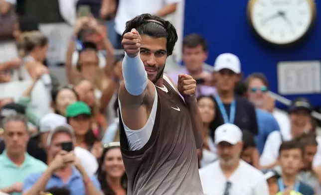Carlos Alcaraz, of Spain, gestures after he won his match against Wu Yibing, of China, during the third round of the U.S. Open tennis championships Friday, Sept. 4, 2026, in New York. (AP Photo/Kirsty Wigglesworth)