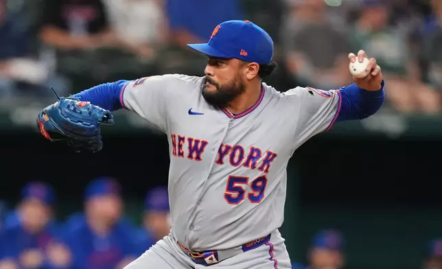 New York Mets pitcher Sean Manaea throws to the Texas Rangers in the first inning of a baseball game Tuesday, Sept. 22, 2026, in Arlington, Texas. (AP Photo/Tony Gutierrez)