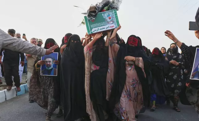 Women carry a coffin during a mass funeral for people killed when, according to Iranian media and a rights group, a U.S. missile struck a home where a wedding was being held in Kuhestak, southern Iran, Thursday, Sept. 3, 2026. (Razieh Poudat/ISNA via AP)