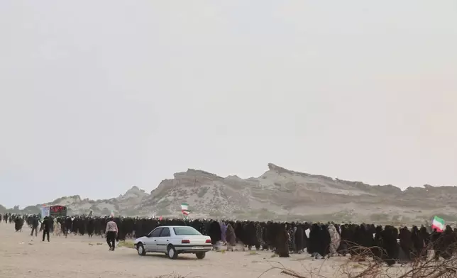 Mourners walk in a mass funeral procession for people killed when, according to Iranian media and a rights group, a U.S. missile struck a home where a wedding was being held in Kuhestak, southern Iran, Thursday, Sept. 3, 2026. (Razieh Poudat/ISNA via AP)