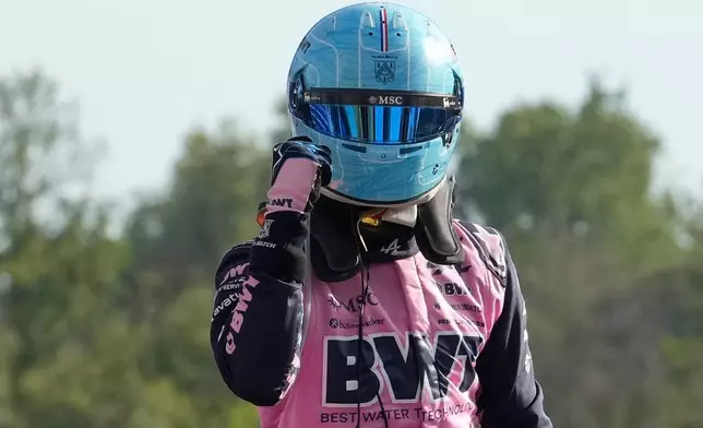 Alpine driver Pierre Gasly of France celebrates his pole position after the qualifying session ahead of the Italian Formula One Grand Prix, in Monza, Italy, Saturday, Sept. 5, 2026. (AP Photo/Luca Bruno)