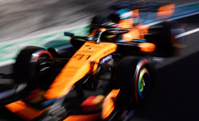 McLaren driver Oscar Piastri of Australia steers his car during the qualifying session ahead of the Italian Formula One Grand Prix, in Monza, Italy, Saturday, Sept. 5, 2026. (Anna Szilagyi/Pool Photo via AP)