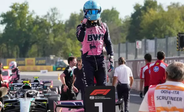Alpine driver Pierre Gasly of France celebrates his pole position after the qualifying session ahead of the Italian Formula One Grand Prix, in Monza, Italy, Saturday, Sept. 5, 2026. (AP Photo/Luca Bruno)