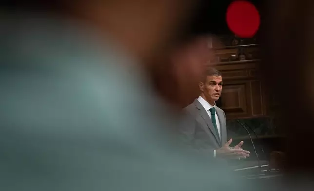 Spanish Prime Minister Pedro Sánchez addresses lawmakers about the situation in Ceuta, the Spanish exclave in North Africa facing a migrant crisis, during a session of Parliament in Madrid, Thursday, Sept. 3, 2026. (Fernando Sánchez/Europa Press via AP)