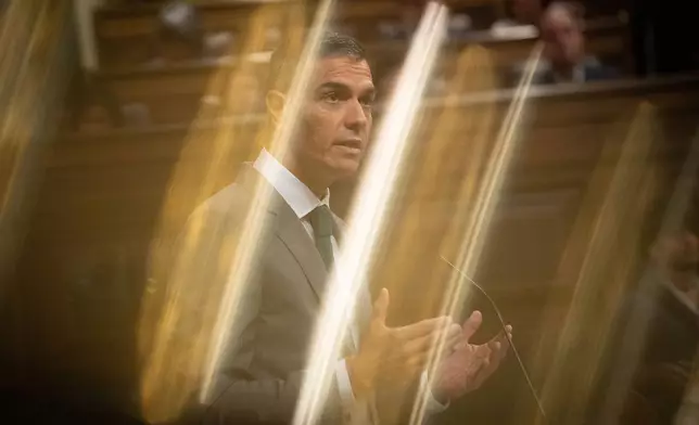 Spanish Prime Minister Pedro Sánchez addresses lawmakers about the situation in Ceuta, the Spanish exclave in North Africa facing a migrant crisis, during a session of Parliament in Madrid, Thursday, Sept. 3, 2026. (Fernando Sánchez/Europa Press via AP)