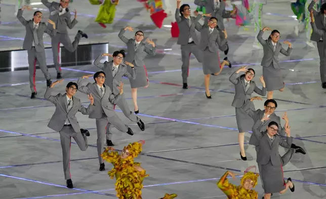 Dancers perform during the opening ceremony for the Asian Games in Nagoya, Japan, Saturday, Sept. 19, 2026. (AP Photo/Dita Alangkara)